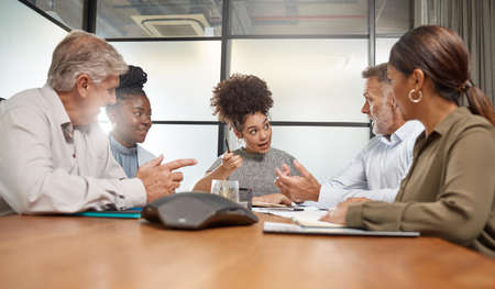 Sometimes you have to have difficult conversations. Shot of a group of businesspeople in a meeting...