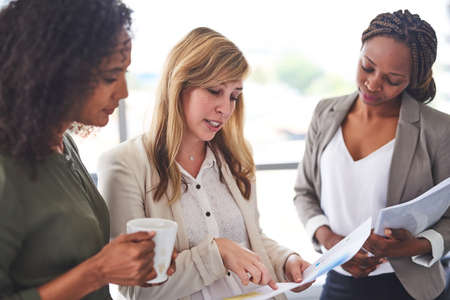 Just another day in the office. Cropped shot of a group of businesswomen working in the office.
