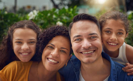 Family time makes each face a happy face. Cropped portrait of a happy family spending some time...