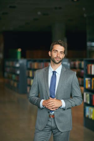 Are you ready to share some ideas. Cropped portrait of a handsome young businessman standing with...