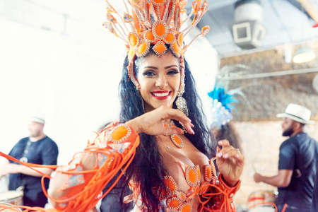 Samba, the beauty of Brazil. Shot of a beautiful samba dancer performing at a carnival.の写真素材