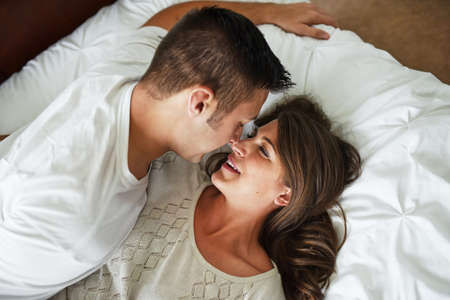 We love spending time together. Shot of young couple spending their day indoors.