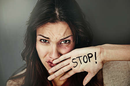 Its about time we put a stop to domestic abuse. Portrait of a beaten and bruised young woman with...