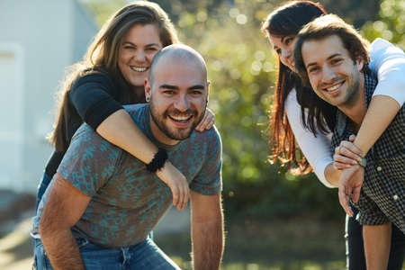 Double the fun. Cropped shot of two happy couples out on a double date.
