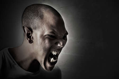 Freeing the beast. Computer manipulated shot of a man turning into a monster.の写真素材