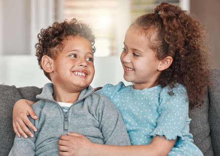 Youll always have a friend in me. Shot of two little siblings spending time together at home.の写真素材