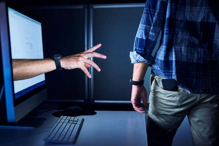 No one is safe from cyber crime. Cropped shot of an unrecognizable male hackers hand reaching out...