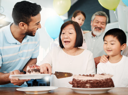 You are my kind of crazy. Shot of a happy family celebrating a birthday at home.