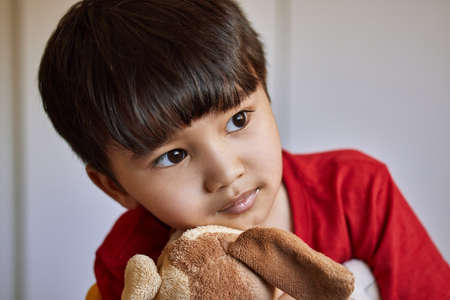 The purity of childhood is so precious. Shot of an adorable little boy playing with his stuffed toys...