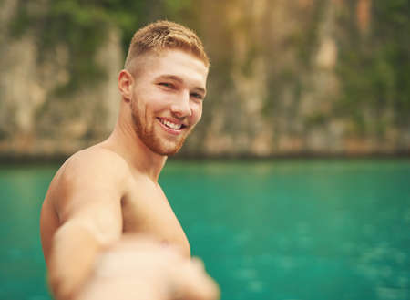 Sometimes a photograph is actually what you need. Cropped portrait of a young man taking a selfie...
