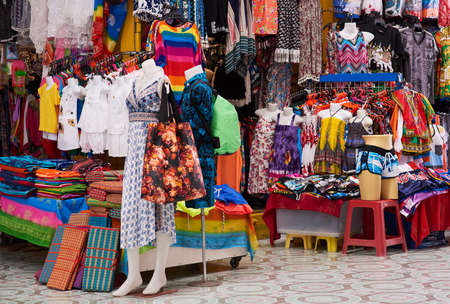 Pick and choose. Shot of a market stall selling clothes.の写真素材