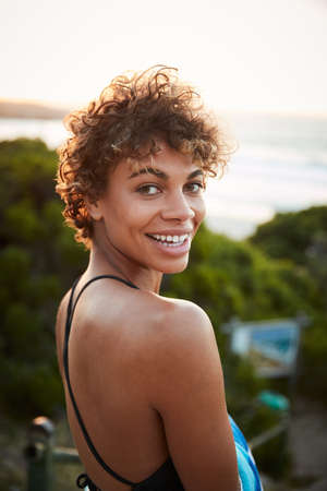 Summer is waiting. Portrait of a beautiful young woman spending the day outdoors on a sunny day.