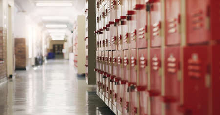 Today four walls, tomorrow open doors. Shot of an empty corridor in a high school.の写真素材