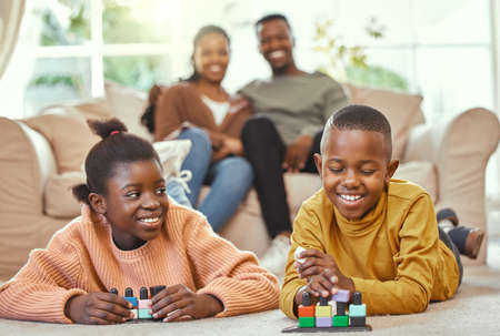 Free time is for playing. Shot of a brother and sister playing together.の写真素材