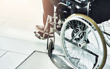 Your independence is assured. Closeup shot of an unrecognizable man sitting in a wheelchair.