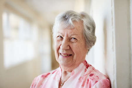 Retirement, you better be ready for me. Portrait of a happy elderly woman at a retirement home.の写真素材