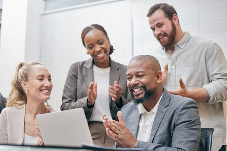 Theyre impressed. Cropped shot of a group of white collar businesspeople clapping while gathered...