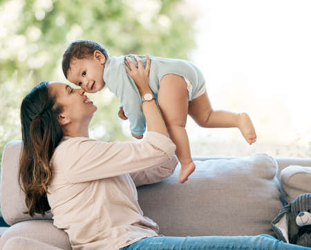 Babies are the greatest source of joy in the world. Shot of a young mother bonding with her adorable...