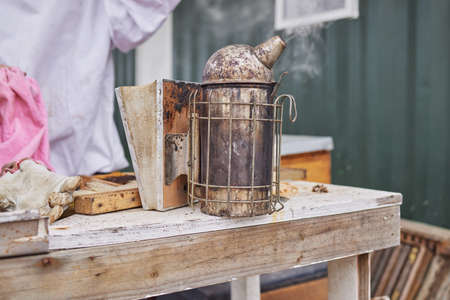 Shot of a bee smoker on a farm.の写真素材
