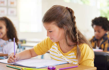 Colouring is the perfect time to practice naming the colours. Shot of a preschooler colouring in...