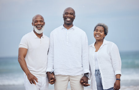 Nothing without them. Shot of a mature couple enjoying time with their son at the beach.