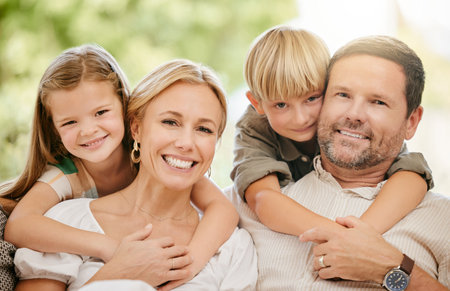 Young cheerful caucasian family enjoying relaxing time together on the weekend at home. Loving...