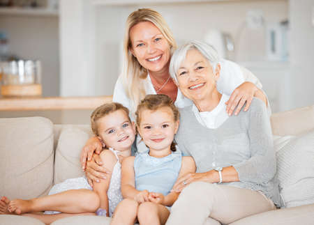 Theres lots of love to go around. Shot of two little girls spending time with their mother and...