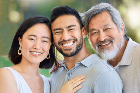 Happiness is at the heart of family. Shot of a happy young man and woman spending time with their...