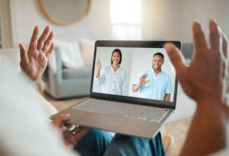 Caller ID was invented for family screening. Shot of a unrecognizable man on a video call at home.