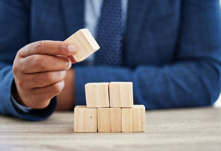 By failing to prepare, you are preparing to fail. Shot of an unrecognisable businessman working with...
