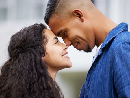 This feels like peace. Shot of a young couple spending time together in their garden at home.