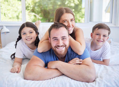 Weve got a home filled with love. Shot of a young family spending time together at home.の写真素材
