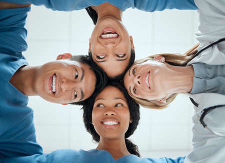 There are times for playing. Cropped shot of a group of medical practitioners having a private...