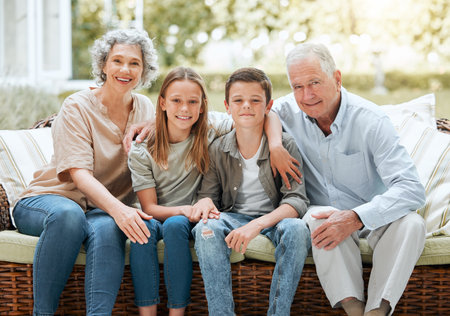 When we count our blessings, we count our grandchildren twice. Shot of a senior couple sitting...