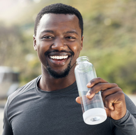 Do whatever is good for you. Shot of a man drinking water while out for a workout.