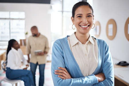 Never been happier with my team. Portrait of a confident young businesswoman working in a modern...