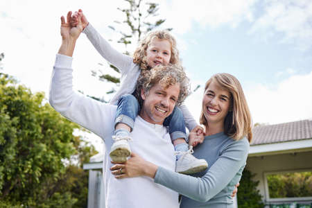 Family is the beginning of every happy story. Portrait of a beautiful family having fun with their...