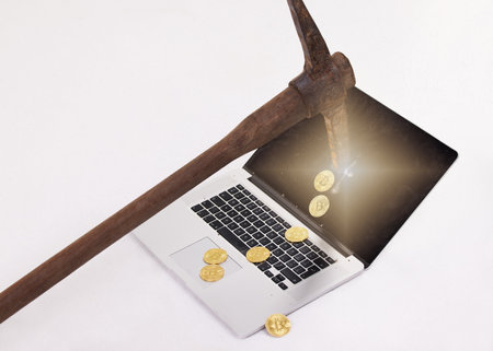 Financial peace isnt the acquisition of stuff.. a pick hitting the screen of a laptop against a...