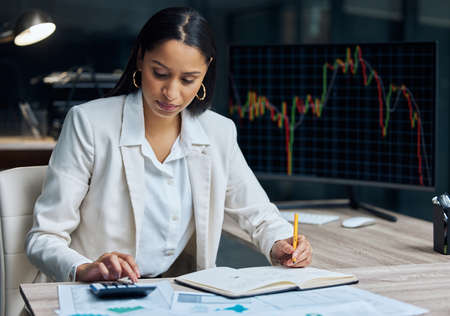 I could up my investment. an attractive young businesswoman sitting alone in her office at night and...