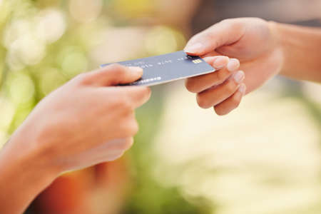 Keep your card secure. a customer using a card to make a payment.