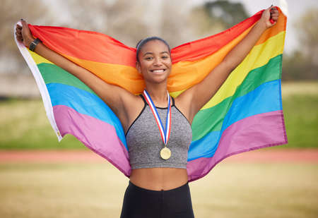 When one wins, we all win. Cropped portrait of an attractive young female athlete celebrating her victory.の写真素材