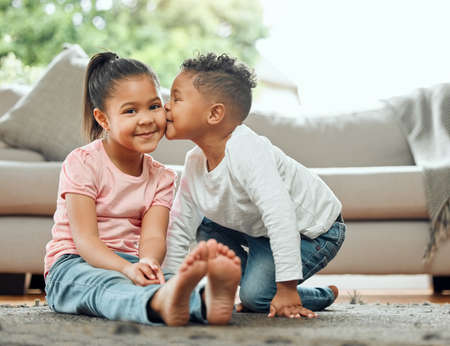 Nothing can take this love away. Portrait of two young siblings bonding and being affection while...