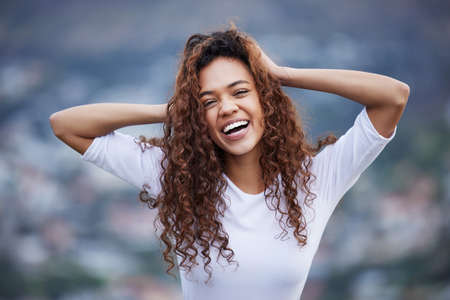 I go nuts for nature. Cropped portrait of an attractive young woman out for an early morning hike in...