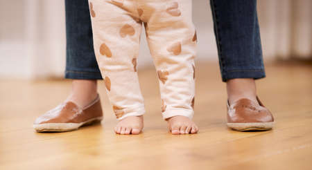 Life began with waking up and loving my mothers face. a unrecognizable mom helping her baby learning...