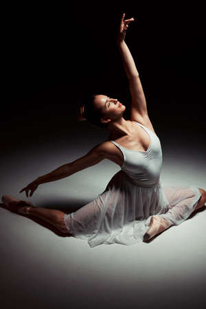 A dancer is merely an artist in motion. Full length shot of an attractive young ballerina dancing...