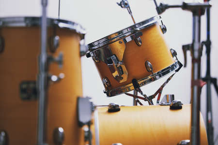 Life would be dull without music. a drum set in an empty studio during the day.の写真素材