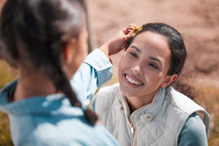 No job is more rewarding than motherhood. a little girl and mother spending time together on a...