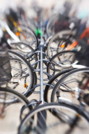 Bikes - lens blurred. A lens blurred photo of lots of parked bikes. Useful as background..の写真素材