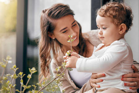 I will never stop giving 100 being the best mom. a mom bonding with her adorable baby boy at home.