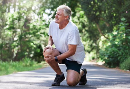 I might have to call the ambulance for this. a mature man experiencing knee pain while exercising...